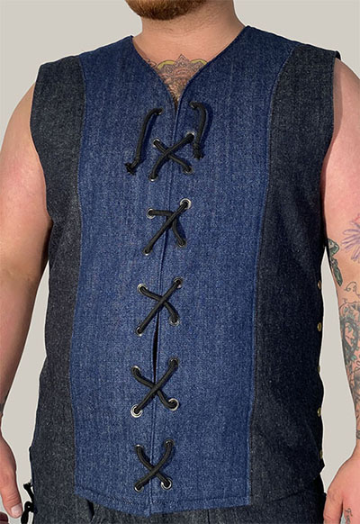 denim vest with open front laced with rope and snap side closure